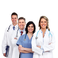 Four Medical Professionals smiling. 
There is two females and two males